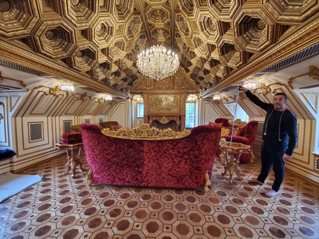 Fireplace design in great room by Andrea D'Alessio