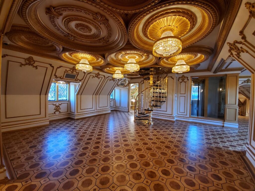 Open-concept luxury great room by Andrea D'Alessio